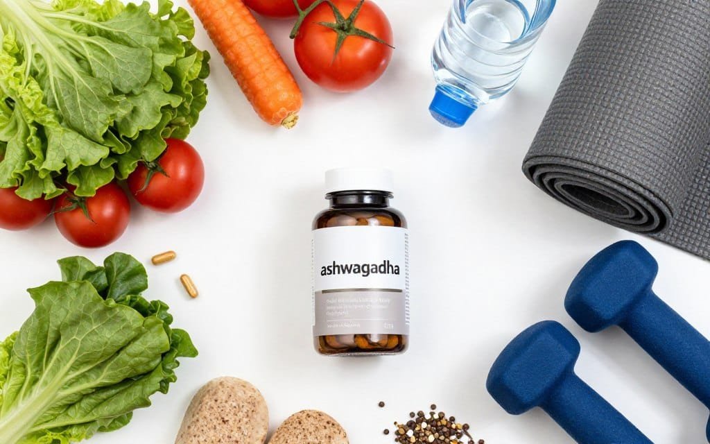 Healthy lifestyle with ashwagandha supplement, nutritious food, and exercise equipment Healthy lifestyle with ashwagandha supplement, nutritious food, and exercise equipment